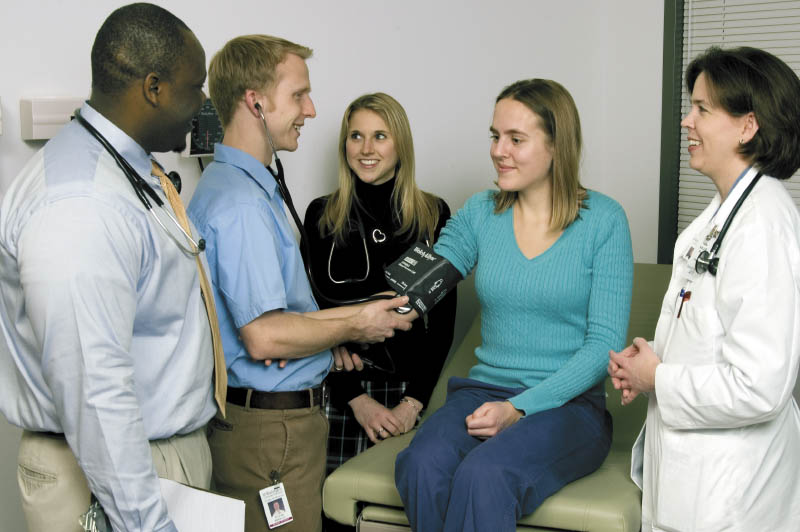 Dr. Brogan and others with patient